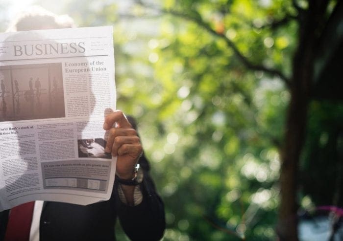 Man with newspaper