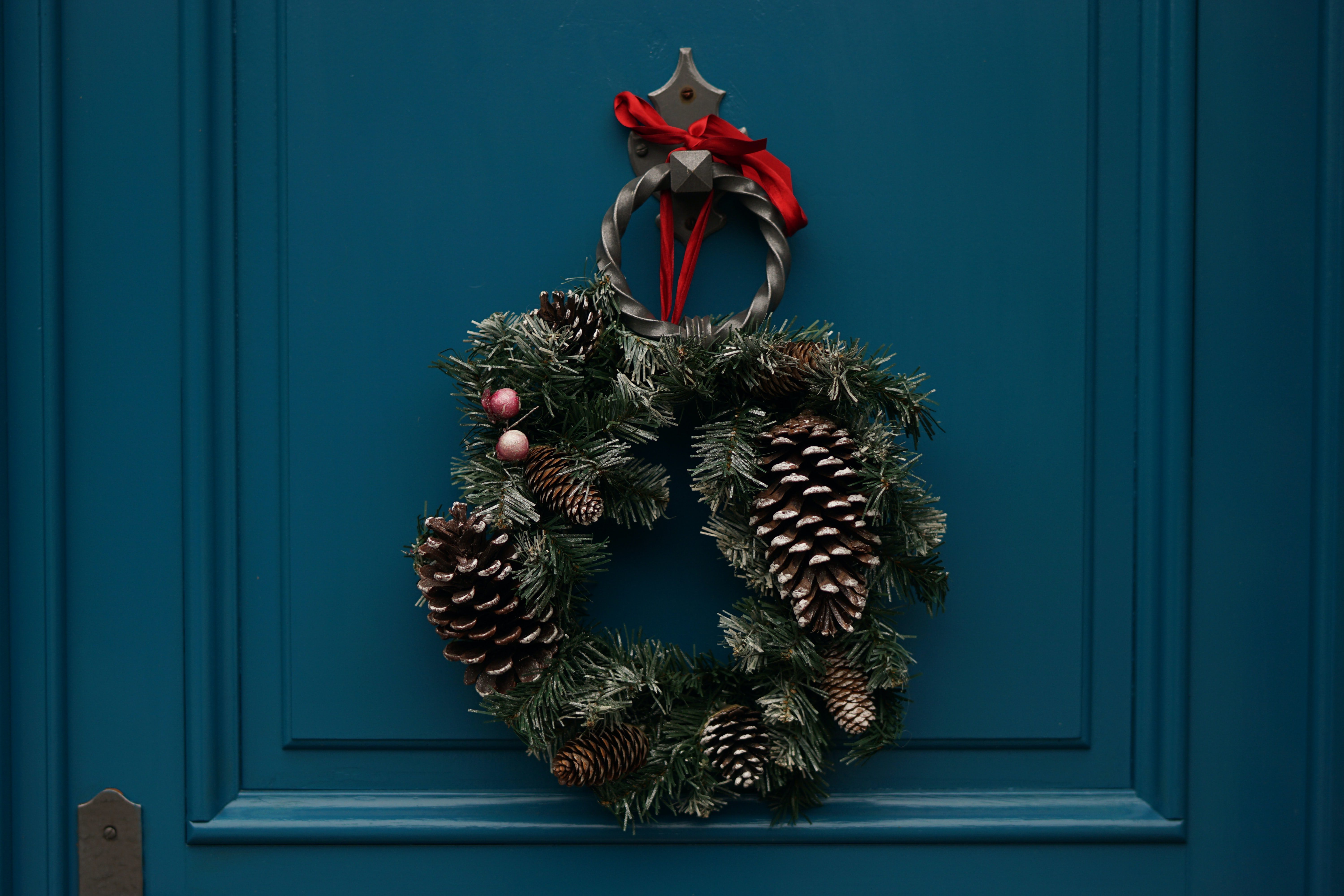 Christmas wreath hung on door knocker